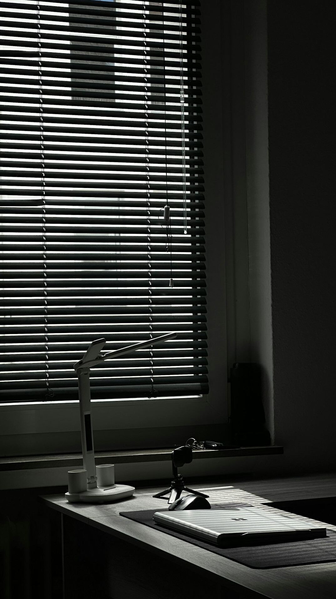 manager reflecting in quiet office